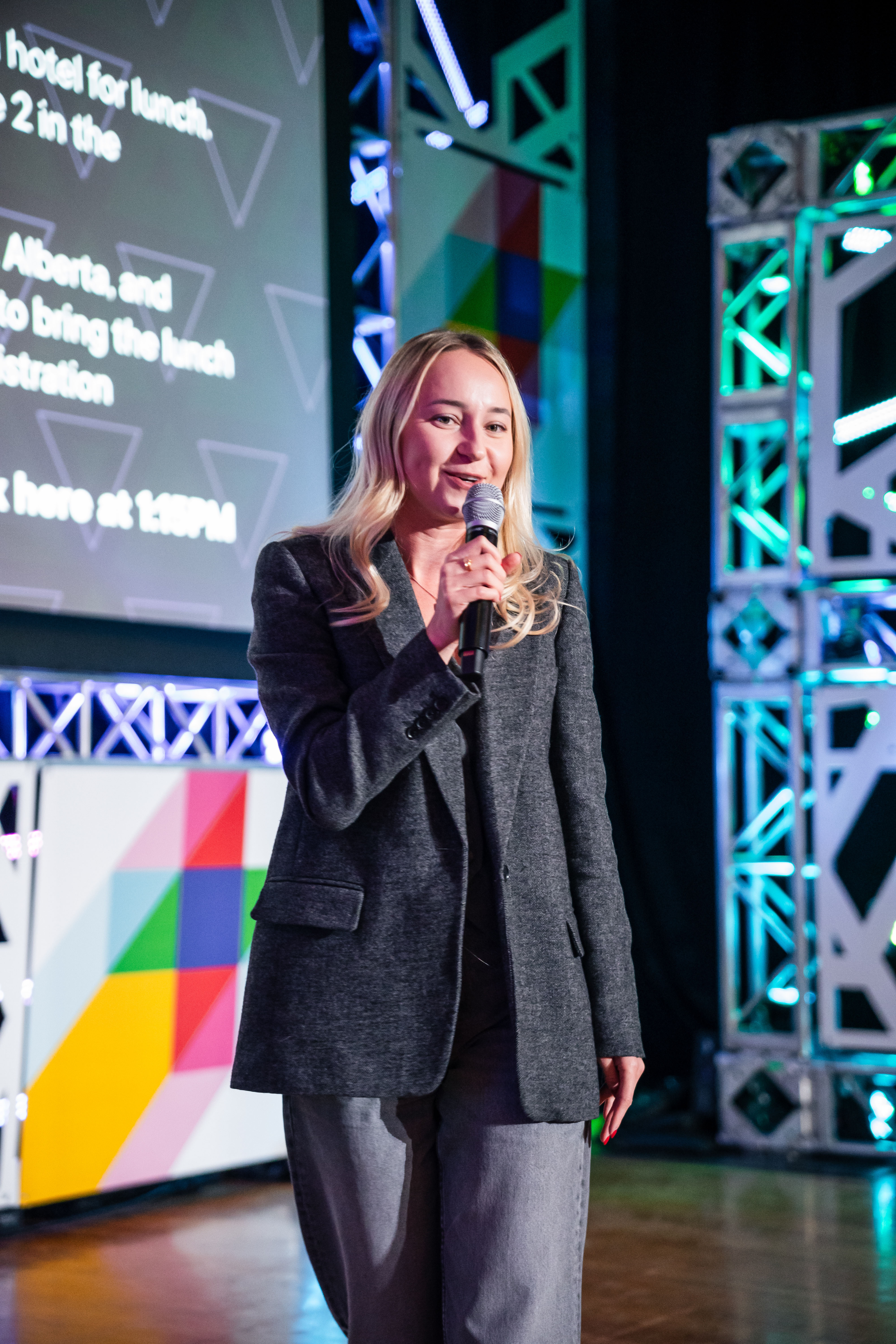 a confident woman addressing an audience